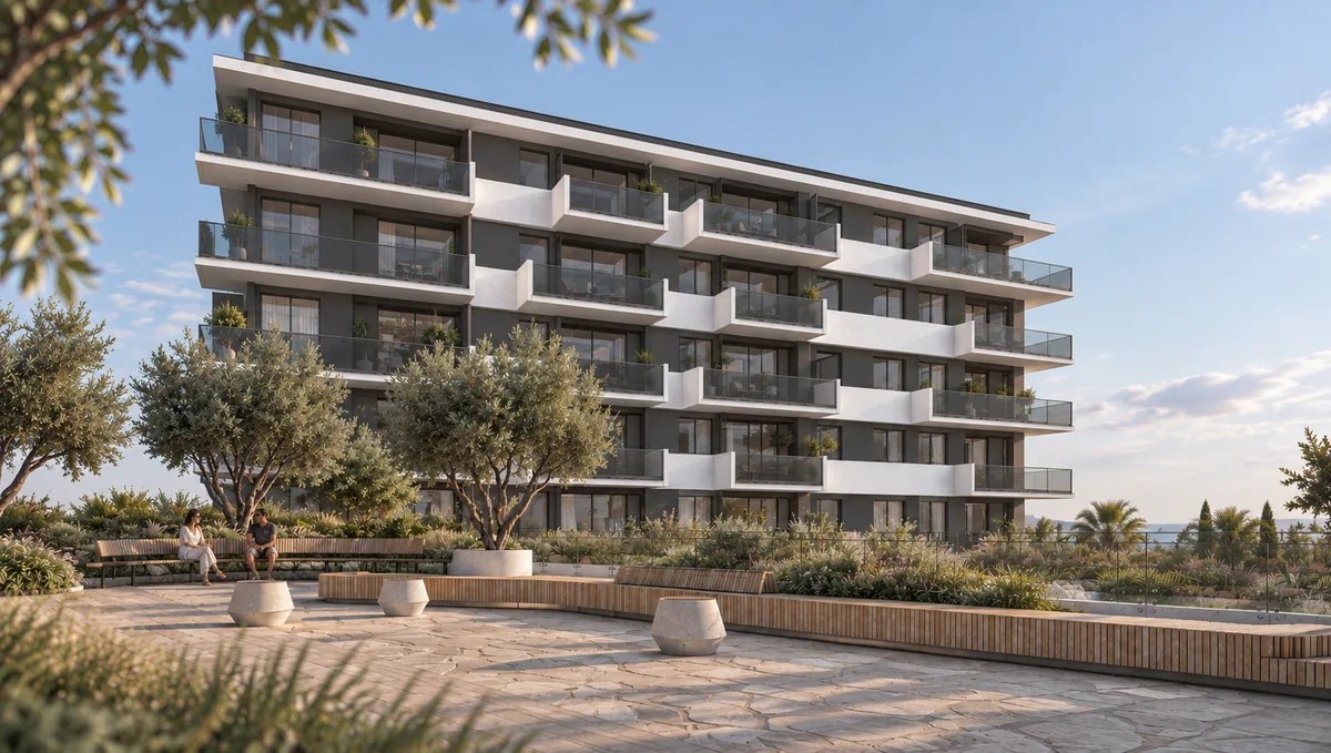 Contemporary residences overlooking stone benches and a landscaped pedestrian courtyard.